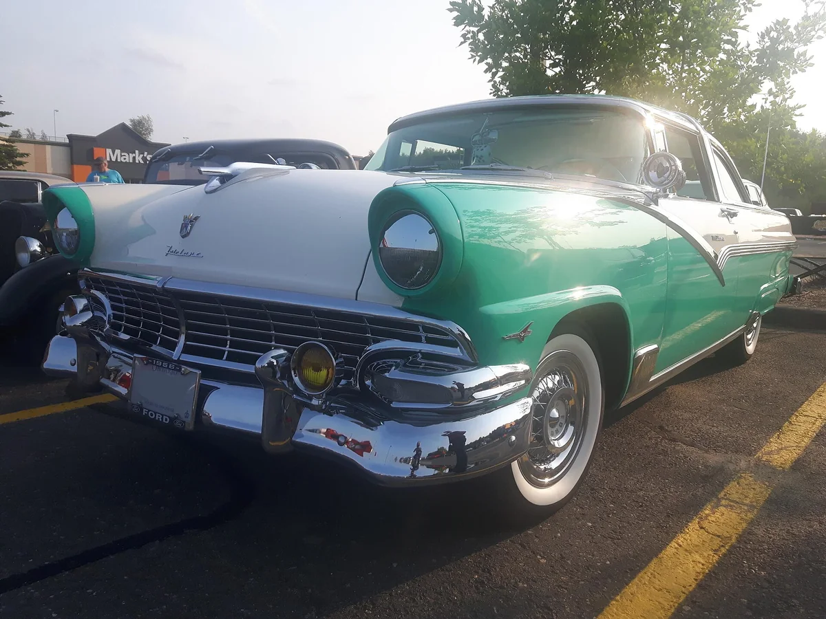 A green and white 1956 Ford Fairlane